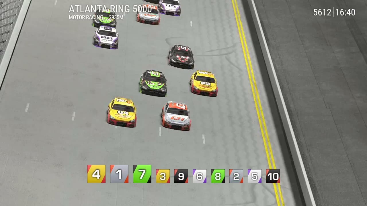 Motor Racing: stock cars on an oval circuit seen from above, with the car numbers listed below.
